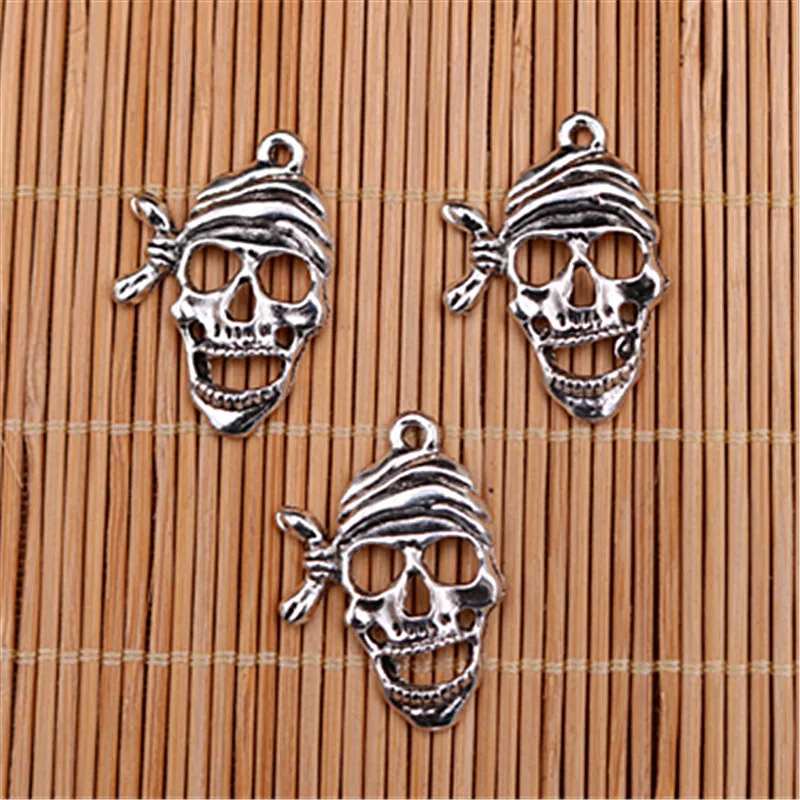 WKOUD 10 шт. серебряного цвета Карибский пиратский череп Шарм панк ожерелье браслет