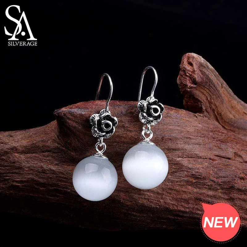 Женские серьги-подвески из серебра с красным гранатом