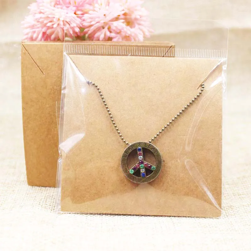 

Diy brown blank paper fashion necklace & charm display card 8.5*8.5cm jewelry pendant package card 100pcs+100 plastic bag