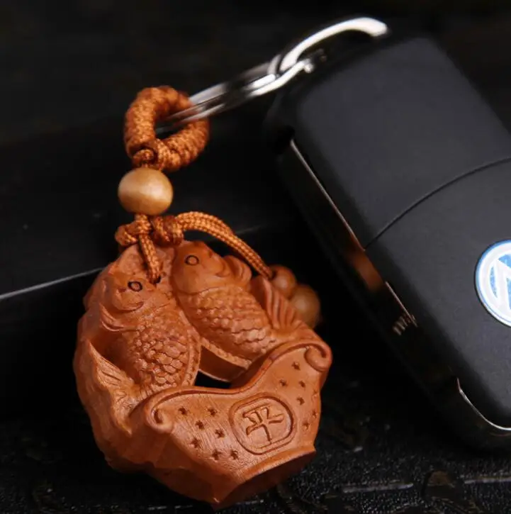 Chinese Peach Wood Carved Safe And Good Luck Double Fish Treasure Yuanbao Exquisite Car Key Chain Pendant | Дом и сад