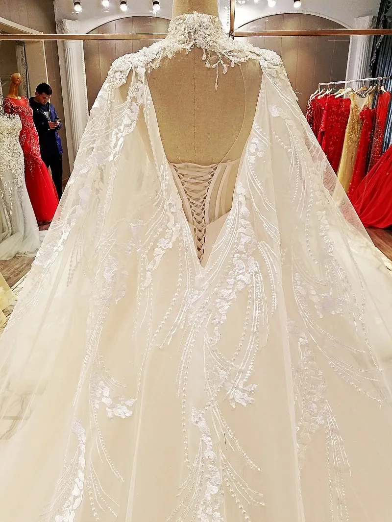 Роскошное кружевное платье с аппликацией из бисера и кристаллов свадебное 2017