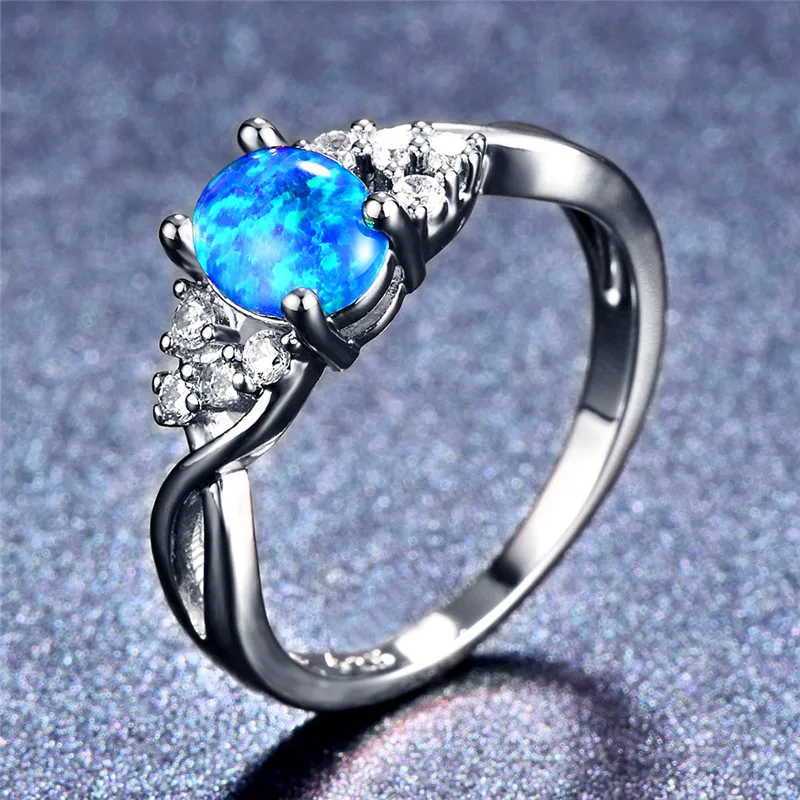 Женское кольцо из белого золота 14 карат с овальным покрытием синее/фиолетовое