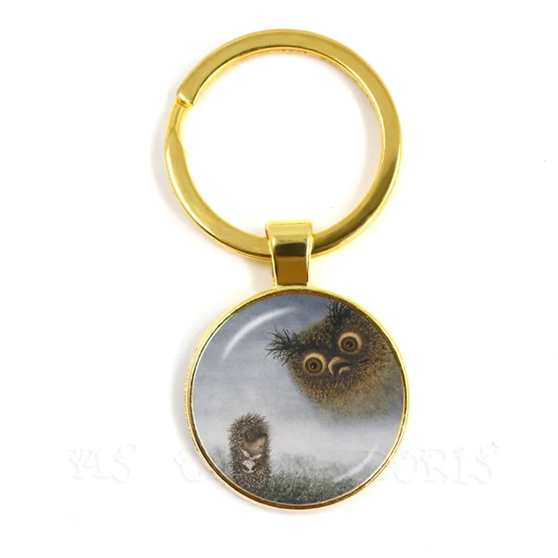 Винтажный брелок с ежиком в тумане позолоченный стеклянный кабошоном купол