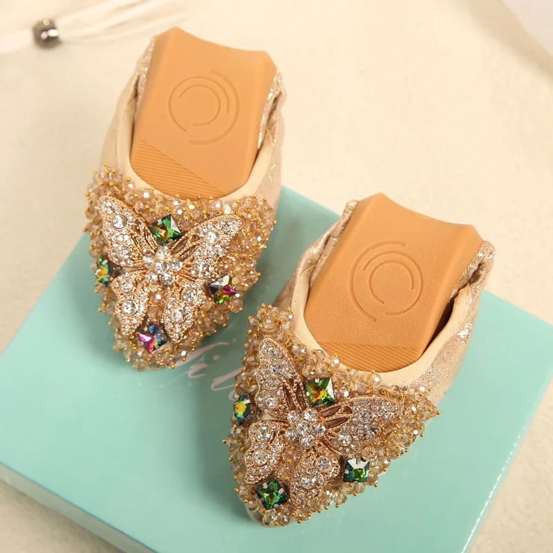 Женские балетки на плоской подошве украшенные бантом бабочкой со стразами