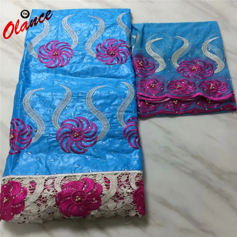

Big fushia windmill pattern light blue dress fabric with Beads 5 yards Bazin Riche and 2 yards net lace PB29 WAX lace Fabric
