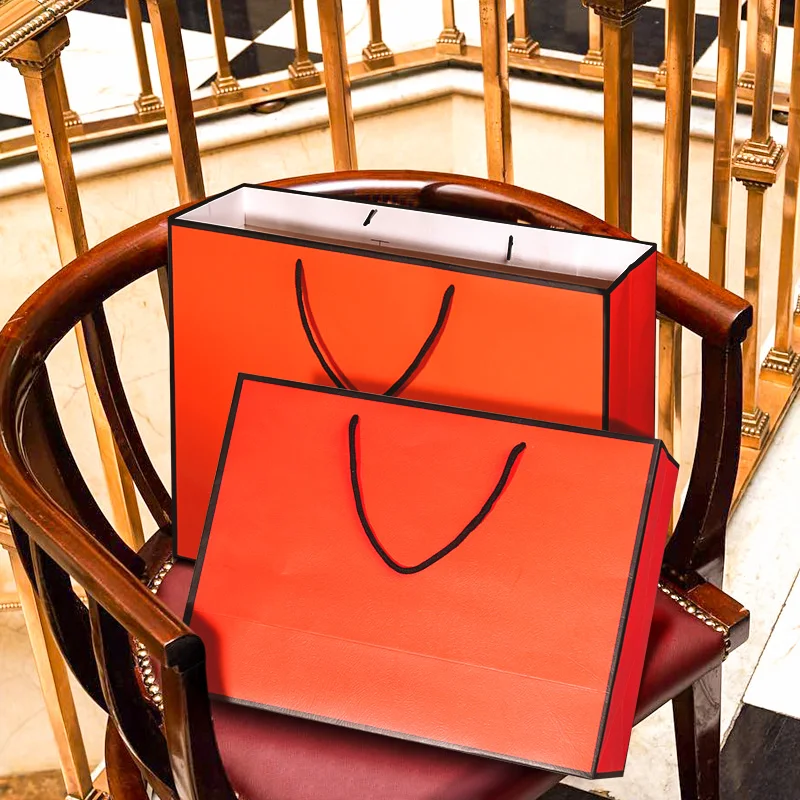 10 шт./лот большой оранжевый крафт бумажный пакет подарочный для одежды с ручками
