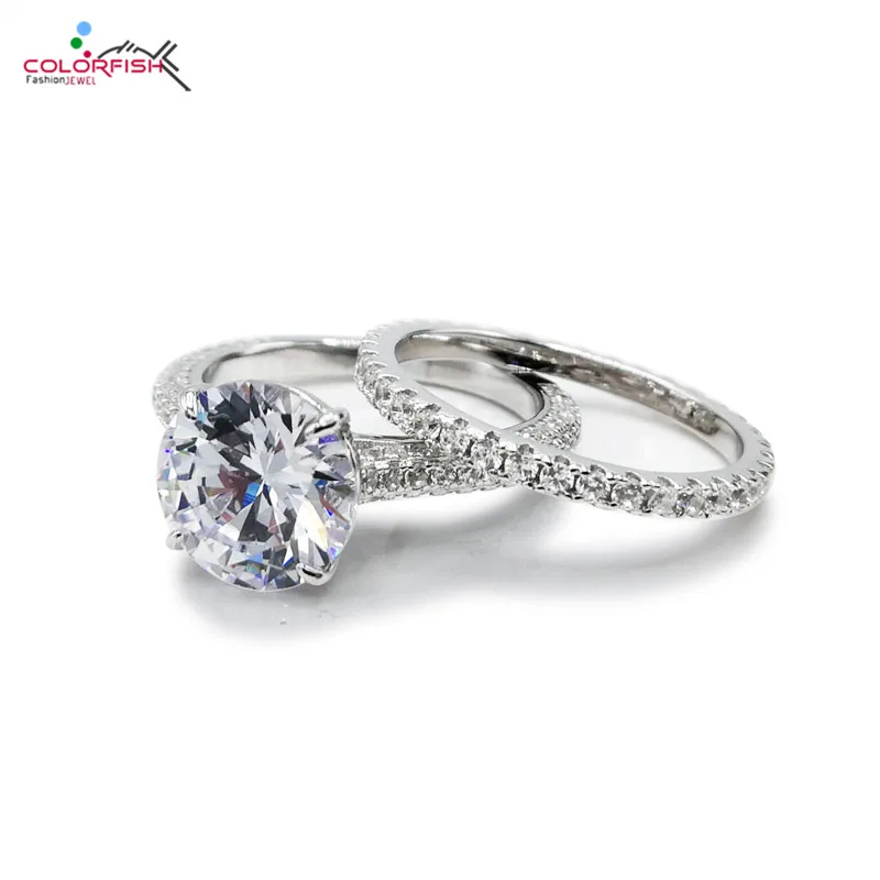

COLORFISH 925 Sterling Silver Round Cut 9.5mm AAAAA Cubic Zirconia Engagement Ring Set for Women Luxury 3 carat Bridal Ring Set