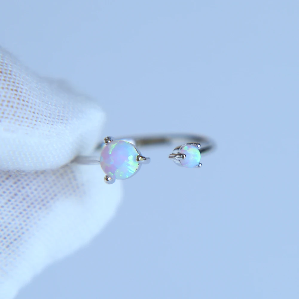 Женское кольцо с двумя опаловыми кольцами элегантное блестящее средней длины