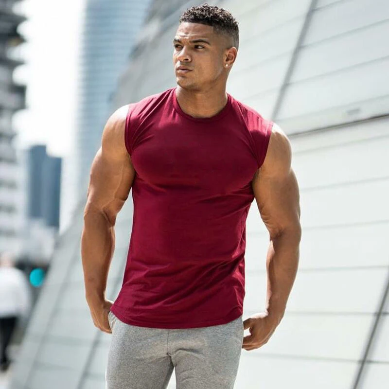 

2023 Summer Newest Brand Mens Curved Hem Solid Color Gyms Stringers Vest Bodybuilding Clothing Fitness Man Tanks Tops