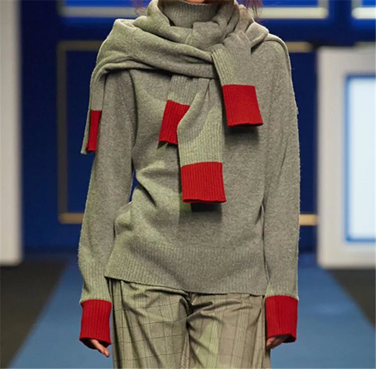 Женский плотный трикотажный пуловер с высоким воротником и рукавом в стиле