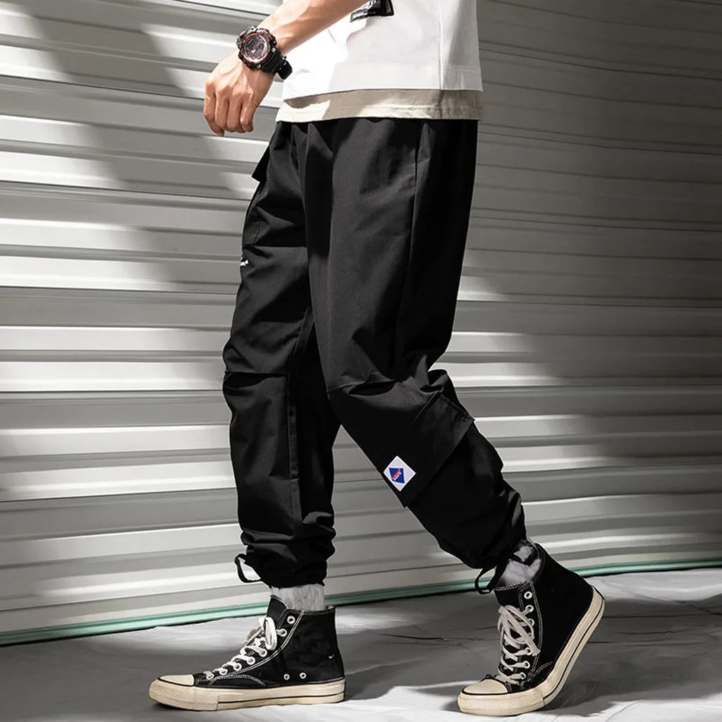 Мужские штаны шаровары с карманами повседневные спортивные свободного покроя в