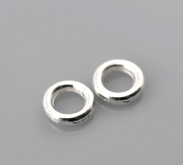 

DoreenBeads Zinc metal alloy Closed Soldered Jump Rings Round silver color Plated 4mm( 1/8") Dia, 250 PCs new