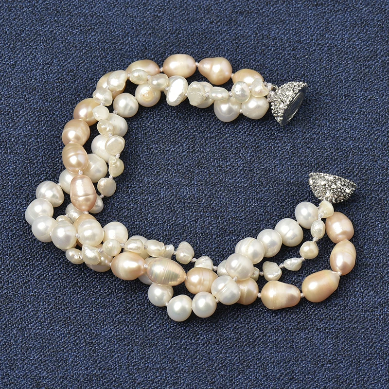 

Consisting of 7*10 mm and 8 mm with 3*6 mm Different shapes and sizes With White and yellow Freshwater Natural pearl bracelet