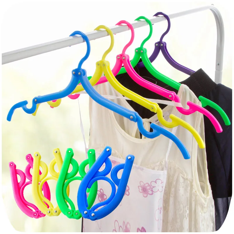 

2pcs/Lot Magic Creative Portable Folding Clothes Hanger Candy Color Anti Skid Universal Multifunctional Rack At Home Or Travel