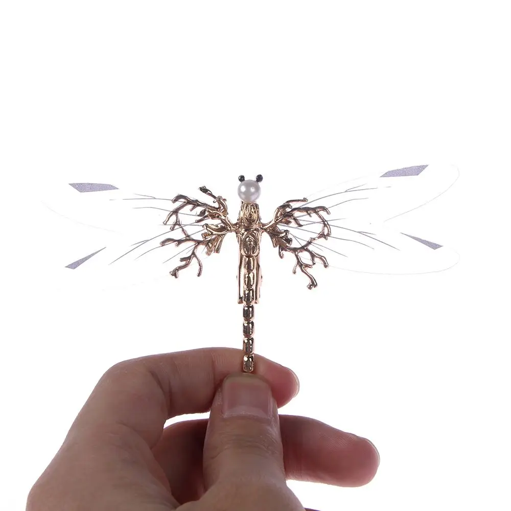 Модные золотые аксессуары для волос со стрекозой и прозрачными крыльями |