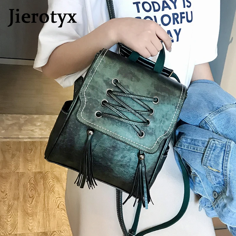 Модный женский рюкзак JIEROTYX черный кожаный с кисточками школьный для девочек