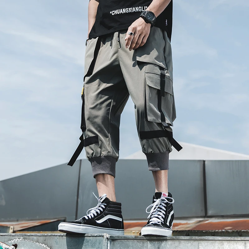 Мужские штаны шаровары в стиле хип хоп черные с несколькими карманами и лентами