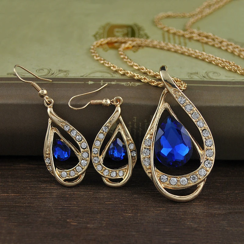 

Women Fashion Jewelry Hollow Design Rhinestone Water Drop Shape Pendant Necklace Earrings 2pcs Girls Wedding Bridal Jewelry Sets