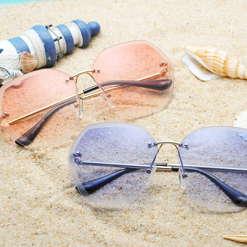 Женские солнцезащитные очки без оправы большие тени розового цвета UV400