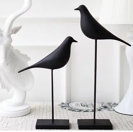 

Резиновая статуэтка птицы