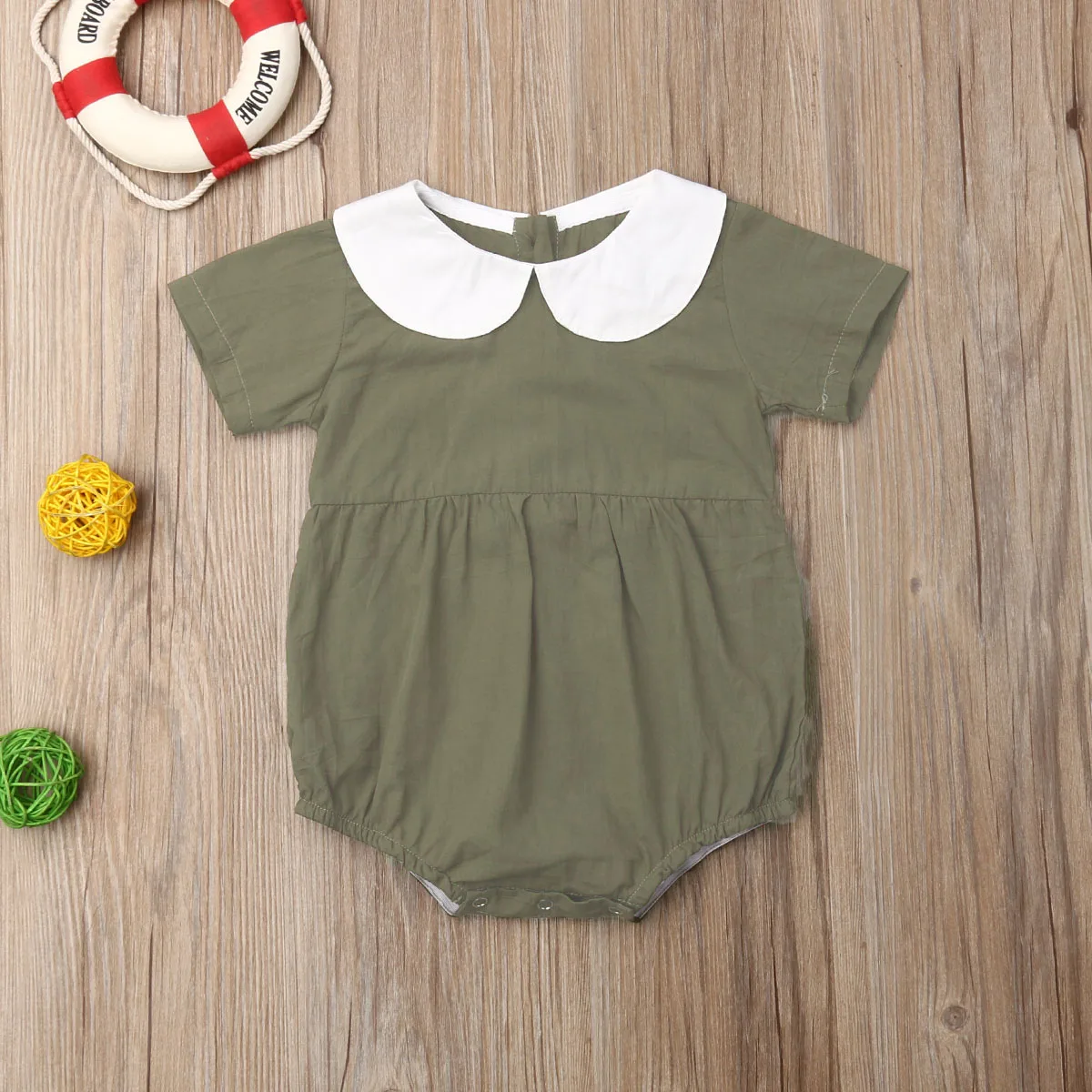 Детское боди с короткими рукавами однотонное круглым воротником для
