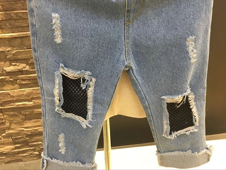 2017 весна голубой рваные джинсы для детей отверстие джинсовые брюки корейский