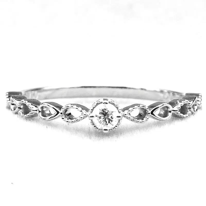 Однотонное обручальное кольцо 14 к из белого золота с натуральным белым сапфиром