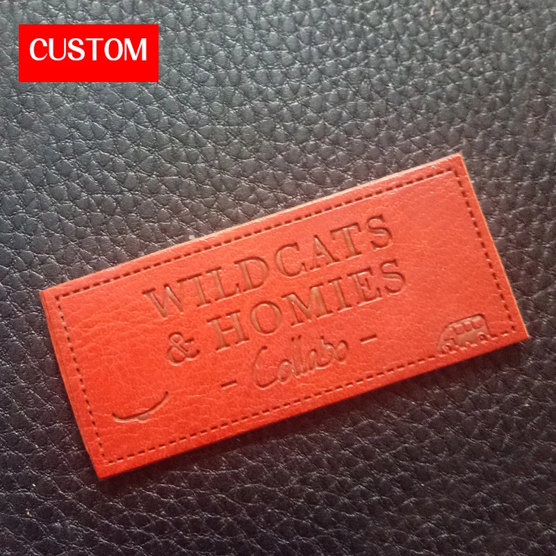 

factory private customzied PU leather embossed labels sewing on ladies clothes printing handmade leather signs for clothing