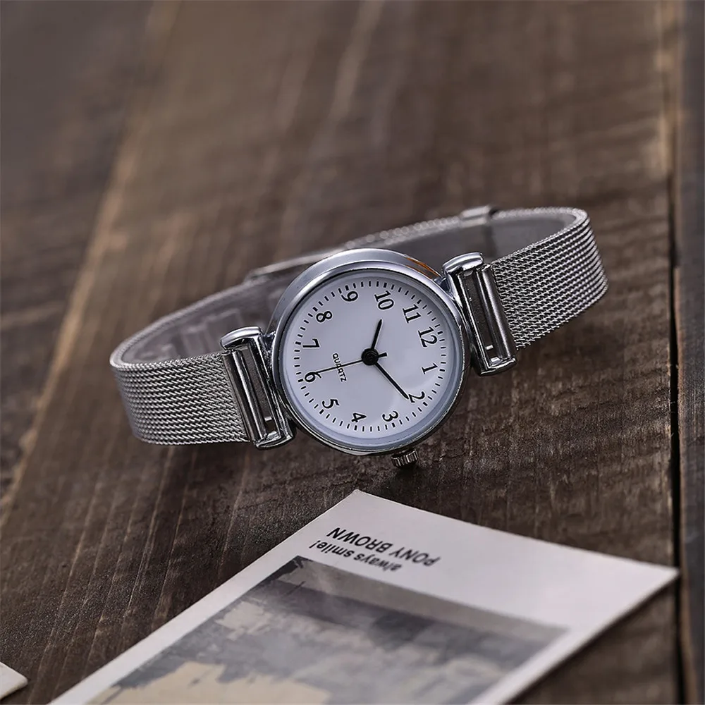 Женские кварцевые часы Vansvar роскошные повседневные с серебряным сетчатым