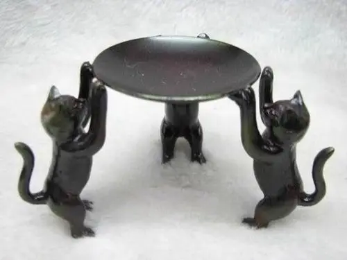 

Wonderful old copper carved three cat hold base statue Candlestick
