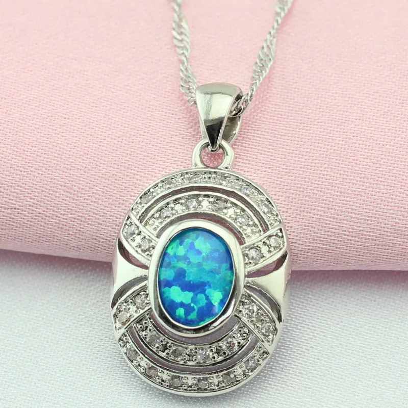 Женский ювелирный комплект из колье и серёг с голубым опалом | Украшения