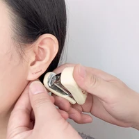 domino handmade staple earrings minimalist an ear hole