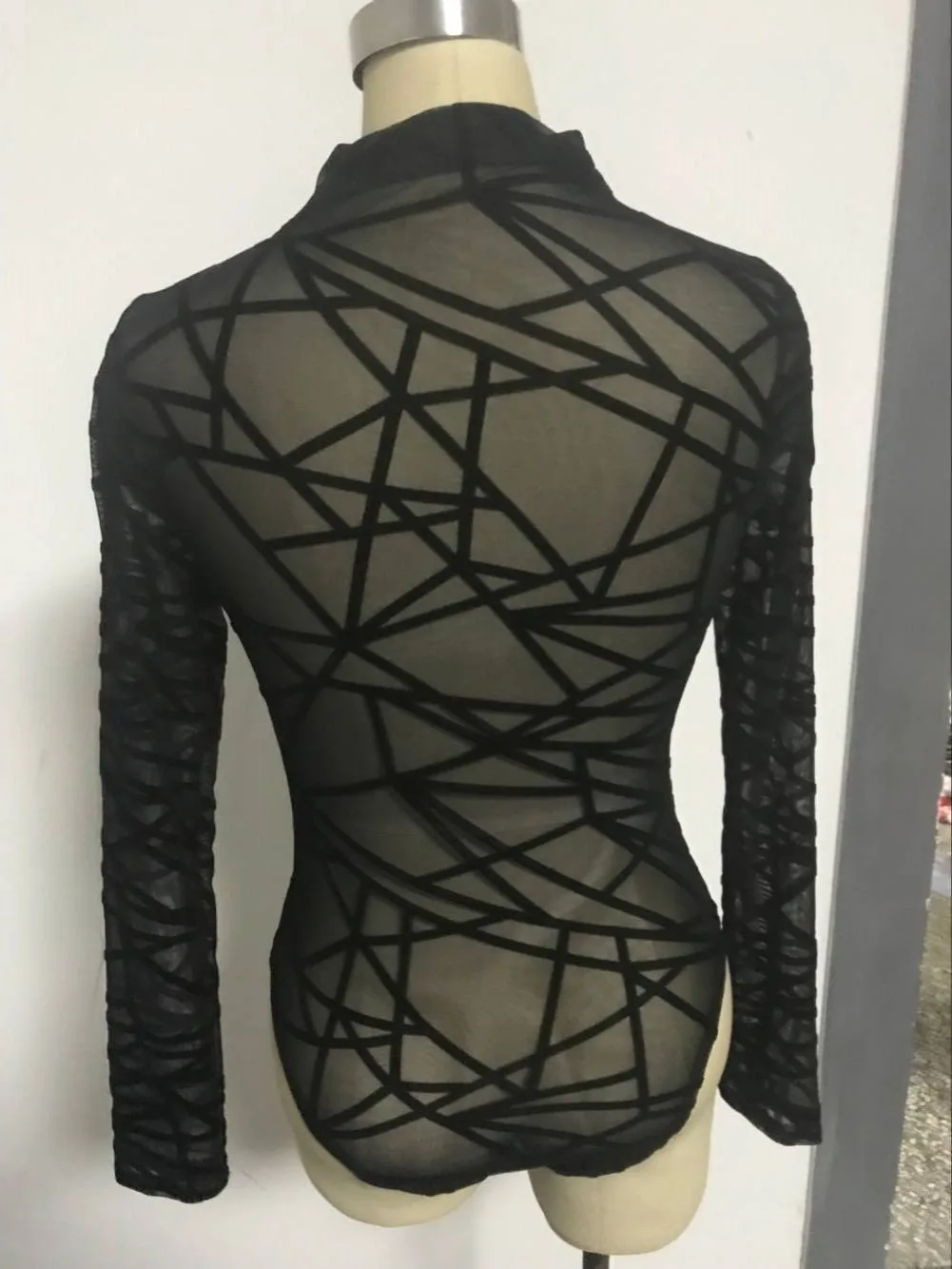 

2019 spring new high collar long sleeve geometric elastic jumpsuit