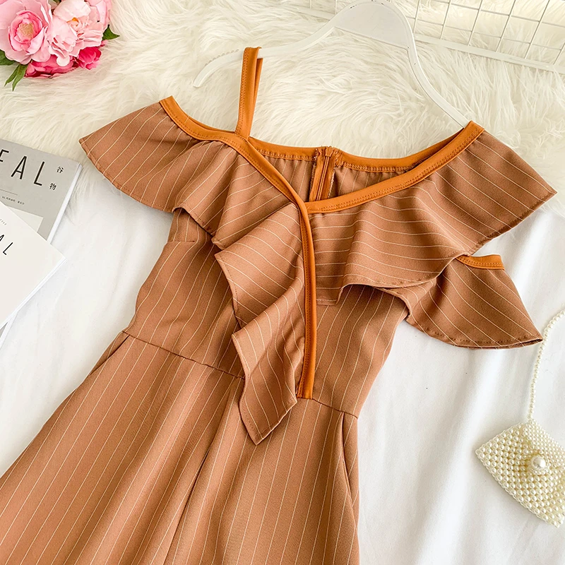 Женский комбинезон с широкими штанинами асимметричный в ретро полоску высокой