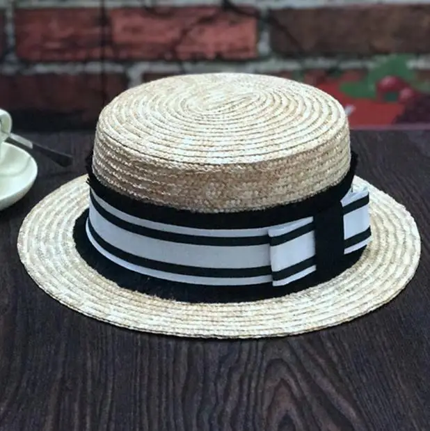 

The new European and American socialite small sweet wind bees straw hat flat top width woven straw hat ms sun hat hat shading
