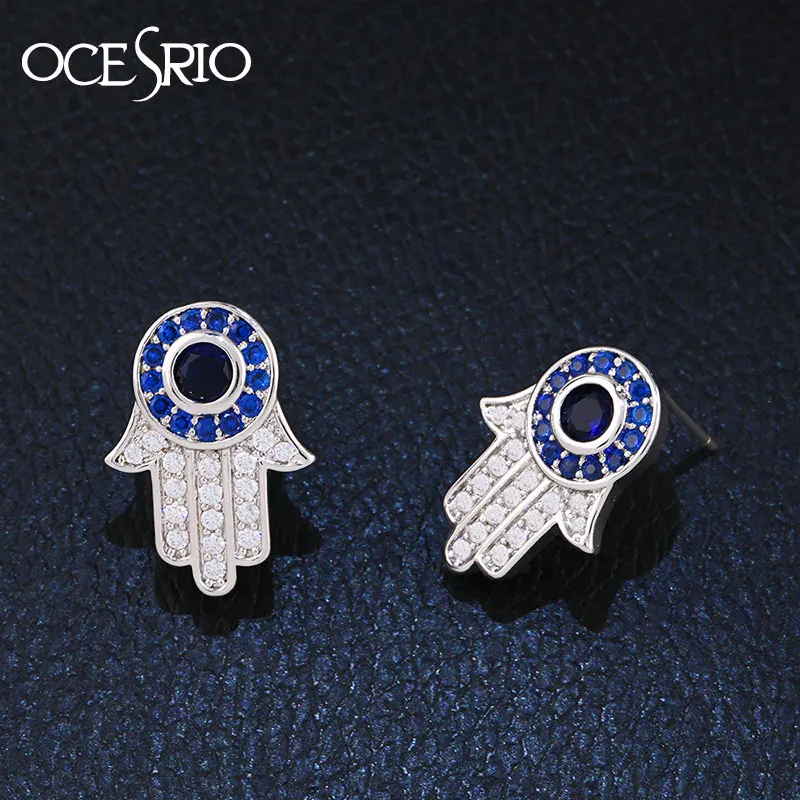 Женские серьги гвоздики OCESRIO Fatima серебряные Хамса из циркона с голубым сглаза