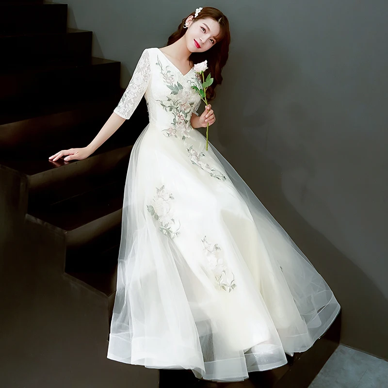 

Champagne 2019 new noble temperament long Chinese banquet dress