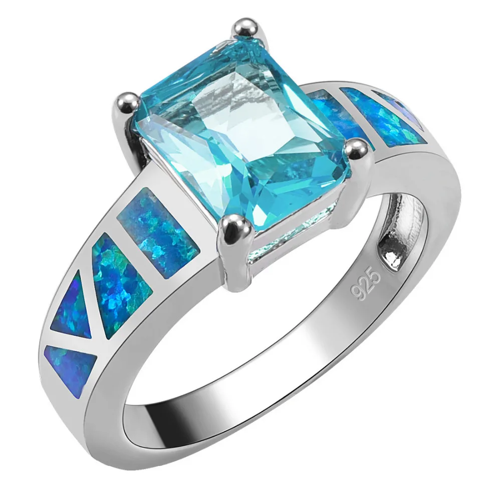 Женское серебряное кольцо с имитацией аквамарина и голубым огненным опалом