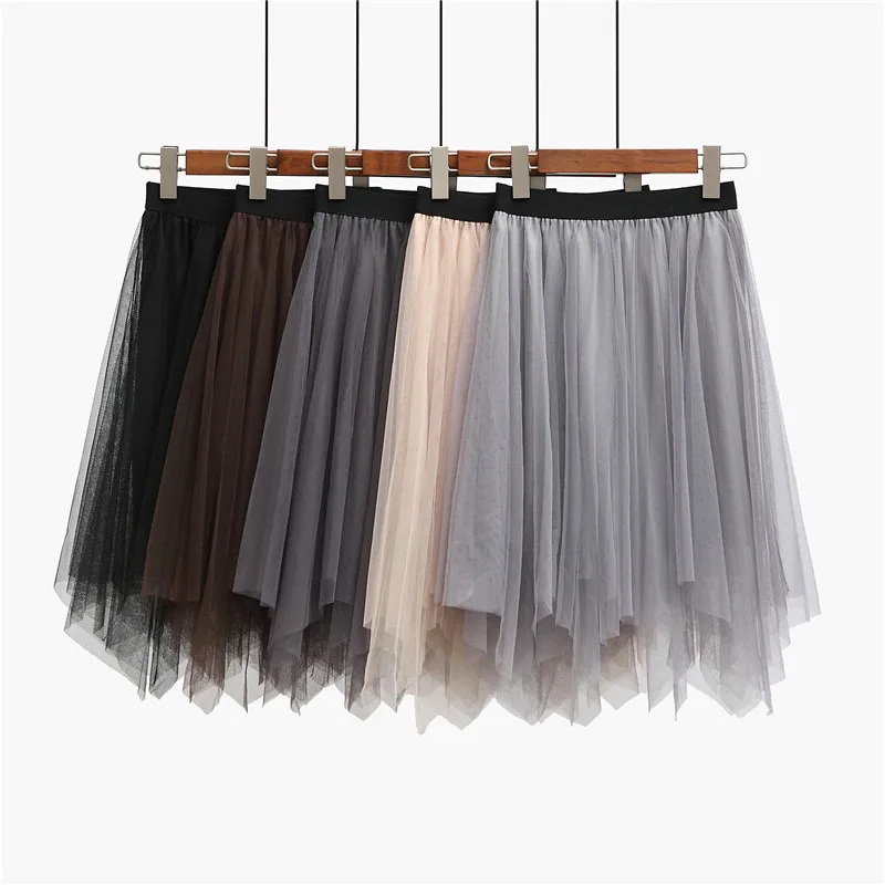 Женская короткая юбка из тонкой прозрачной ткани необычная трапециевидной формы