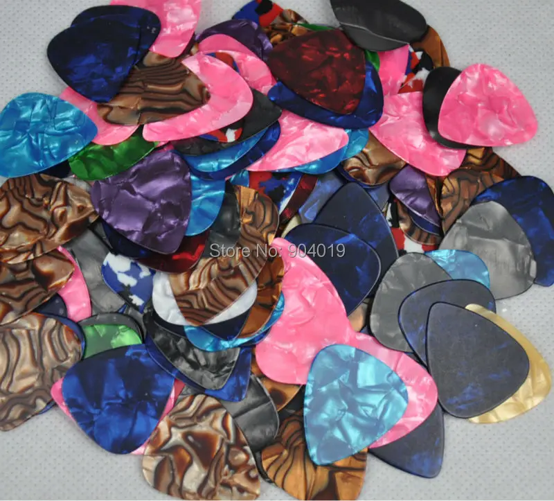 

Lots of 50 pcs new thin 0.46mm Blank guitar picks Celluloid No print Assorted Colors