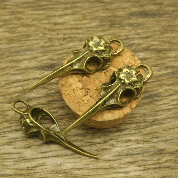 Винтажная подвеска в виде птичьих черепов из бронзового и серебряного сплава 10