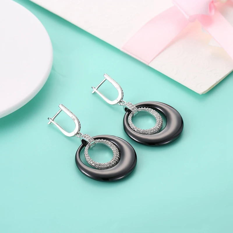 Cyw реального Серебряные ювелирные изделия черной керамики круглые петли полный