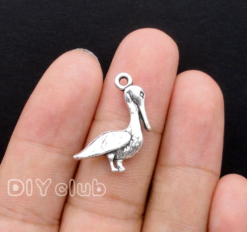 

50pcs-Antique Silver Pelican Charms Pendants 2 Sided 22x20mm
