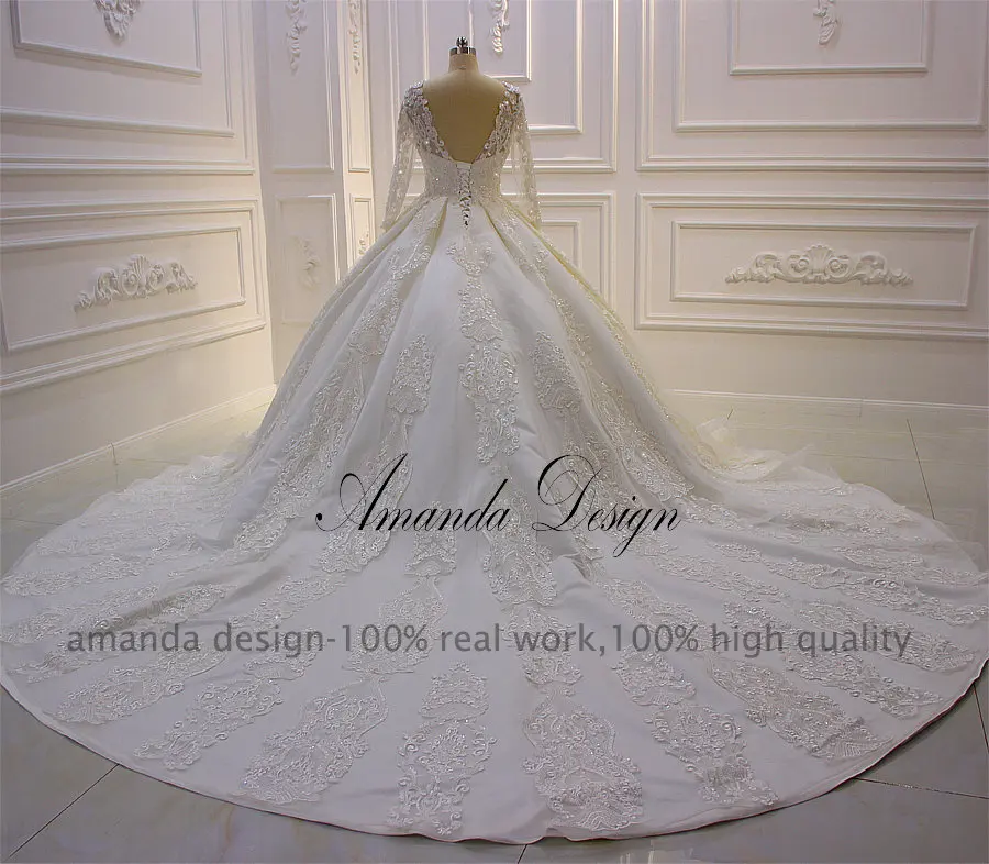 Свадебное платье с длинным рукавом и кружевной аппликацией Amanda Design abito da