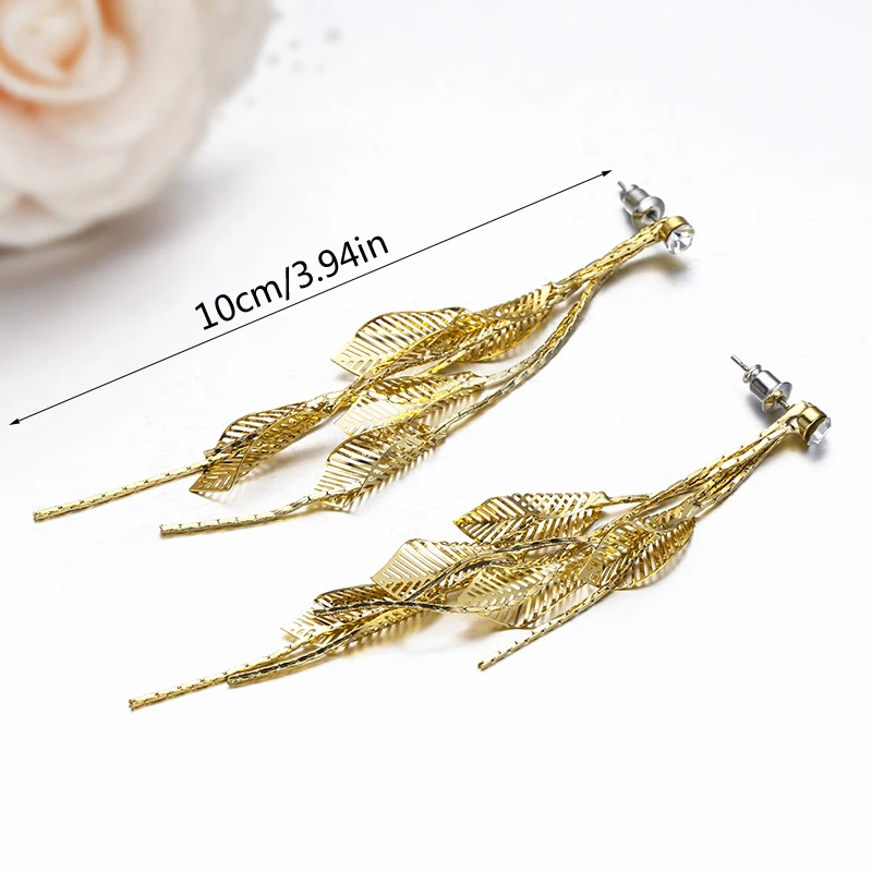 Женские длинные висячие серьги с кисточками в виде листьев и цепочек желтое или