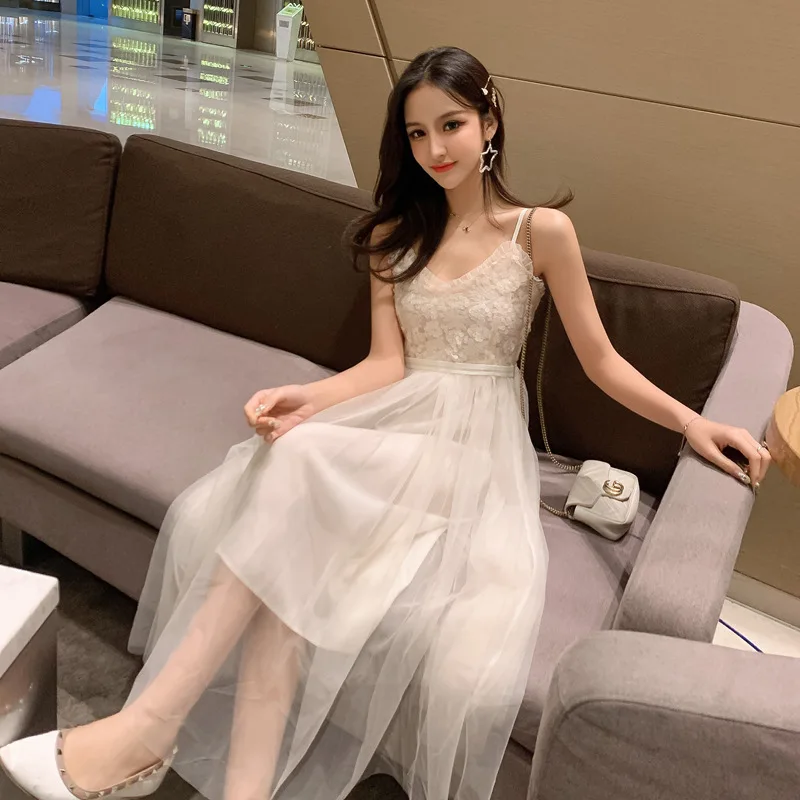 

Fashion New Women's Lace Dress Stitching Mesh Strap Dress