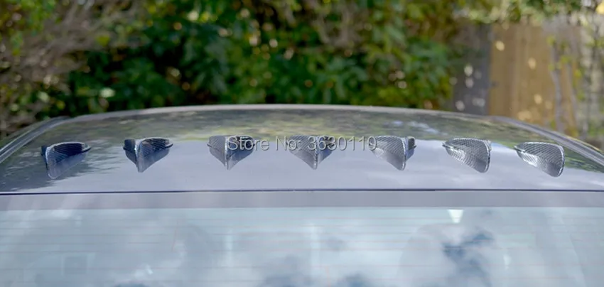 Комплект из 8 универсальных антенн-спойлеров с карбоновым внешним видом для крыши автомобиля, грузовика или внедорожника - черный.