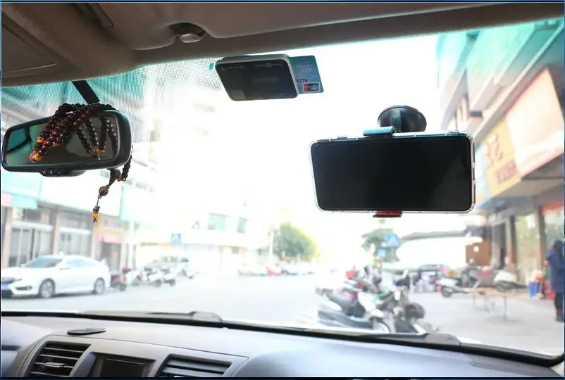 Универсальная автомобильная подставка для крепления на лобовое стекло