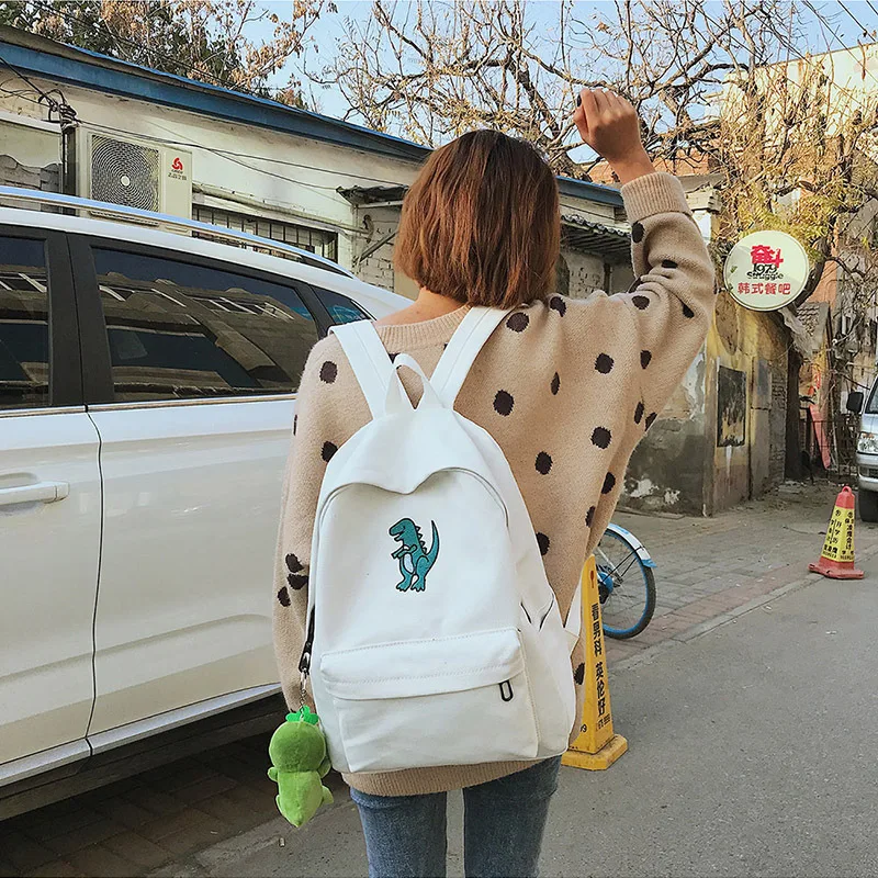 

Dinosaur Animal Pattern Embroidery Backpacks for women 2021 Casual Canvas Bookbag for Teenage Girls Cute Bagpack Daypack Mochila