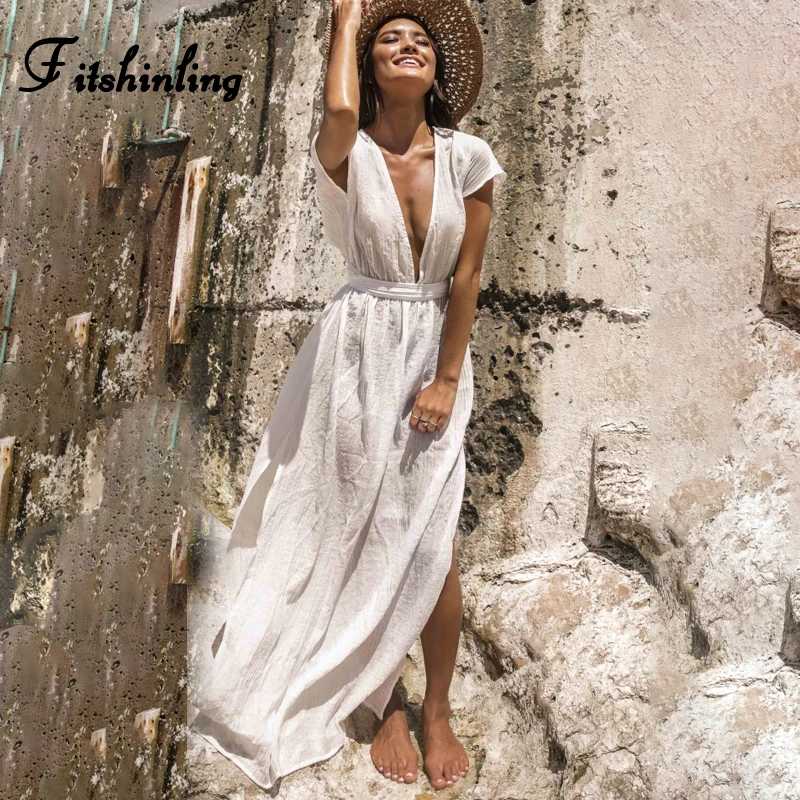 Длинное платье-туника с открытой спиной и глубоким V-образным вырезом в стиле